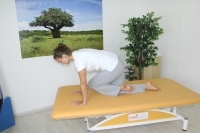 Automatic mobilization of the sacroiliac joint - moving knee forward